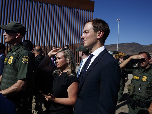 White House senior adviser Jared Kushner, right, watches as President Donald Trump tours a section of the southern border wall, Wednesday, Sept. 18, 2019, in Otay Mesa, Calif. (AP Photo/Evan Vucci)