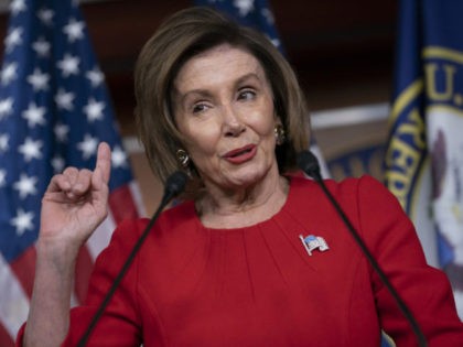 Speaker of the House Nancy Pelosi, D-Calif., talks to reporters on the morning after the first public hearing in the impeachment probe of President Donald Trump on his effort to tie U.S. aid for Ukraine to investigations of his political opponents, on Capitol Hill in Washington, Thursday, Nov. 14, 2019. …