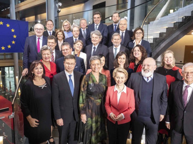 European Commission President Ursula von der Leyen, third right, and Frans Timmermans, second right, first vice-President of the European Commission, pose for a family photo with European Commissioners at the European Parliament Wednesday, Nov. 27, 2019 in Strasbourg, eastern France. Ursula von der Leyen told the EU plenary in Strasbourg, …