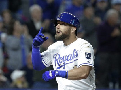 Kansas City Royals' Alex Gordon celebrates as he crosses the plate after hitting a solo home run during the fifth inning of a baseball game against the Philadelphia Phillies Friday, May 10, 2019, in Kansas City, Mo. The homer was Gordon's 1,500th career hit. (AP Photo/Charlie Riedel)