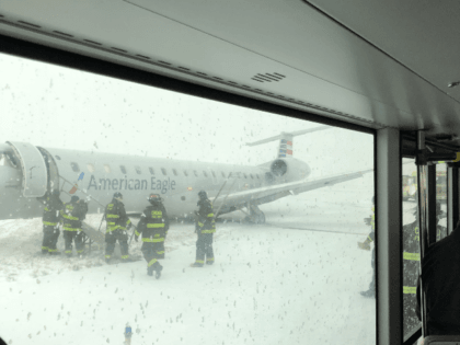 Chicago Fire Department on scene after a plane skidded off runway at O’ Hare. (Credit: Luis Torres Curet)