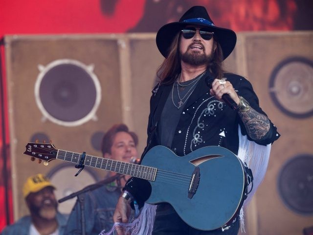 GLASTONBURY, ENGLAND - JUNE 30: Billy Ray Cyrus performs on the Pyramid stage on day five of Glastonbury Festival at Worthy Farm, Pilton on June 30, 2019 in Glastonbury, England. (Photo by Ian Gavan/Getty Images)