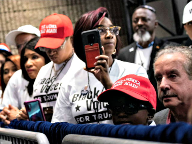 People wait for US President Donald Trump during a rally at the Georgia World Congress Center to court African American votes November 8, 2019, in Atlanta, Georgia. (Photo by Brendan Smialowski / AFP) (Photo by BRENDAN SMIALOWSKI/AFP via Getty Images