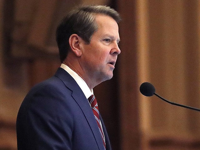 FILE - In this April 2, 2019, file photo, Georgia Gov. Brian Kemp, right, speaks to members of the Georgia House during the final 2019 legislative session at the state Capitol in Atlanta. A lawsuit challenging Georgia's election system can move forward, a judge ruled Thursday, May 30, in the …