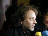 French director Christophe Ruggia (L) and French actor reda Kateb address the media within the launching of "The Appeal of Calais", an initiative by French directors to raise awareness on the situation of migrants in the camp of Calais, on October 21, 2015 at the Louxor movie theater in Paris. …
