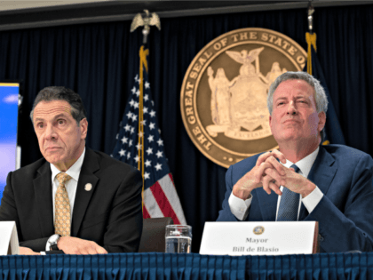 New York Governor Andrew Cuomo and New York City Mayor Bill de Blasio listens to questions
