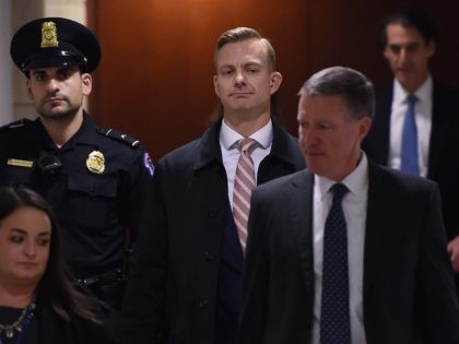 David Holmes, a State Department official, arrives to appear in a closed-door deposition hearing as part of the impeachment inquiry at the US Capitol in Washington, DC, on November 15, 2019. - Holmes allegedly overheard President Trump ask about the status of "investigations" soon after his July phone call with …
