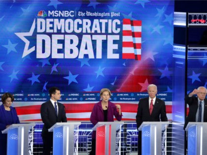 Democratic presidential hopefuls Mayor of South Bend, Indiana, Pete Buttigieg (L), Massachusetts Senator Elizabeth Warren (C) and Former Vice President Joe Biden speak during the fifth Democratic primary debate of the 2020 presidential campaign season co-hosted by MSNBC and The Washington Post at Tyler Perry Studios in Atlanta, Georgia on …