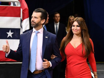 Kimberly Guilfoyle (R) and Donald Trump Jr. arrive at a rally for US President Donald Trump, to officially launch the Trump 2020 campaign, at the Amway Center in Orlando, Florida on June 18, 2019. - Trump kicks off his reelection campaign at what promised to be a rollicking evening rally …