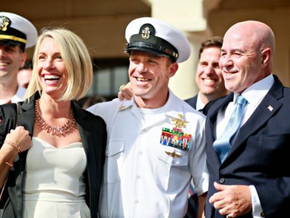 SAN DIEGO, CA - JULY 02:R, Navy Special Operations Chief Edward Gallagher celebrates with his wife Andrea after being acquitted of premeditated murder at Naval Base San Diego July 2, 2019 in San Diego, California. Gallagher was found not guilty in the killing of a wounded Islamic State captive in …