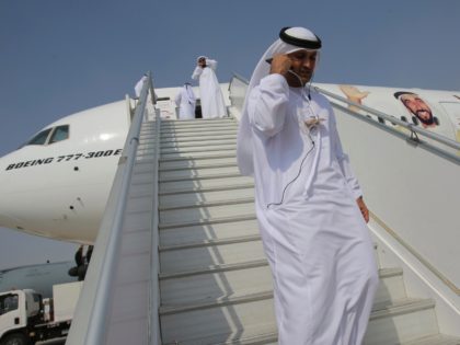 Emirati officials visit an Airbus A-380 decorated with an image of the late Sheikh Zayed b