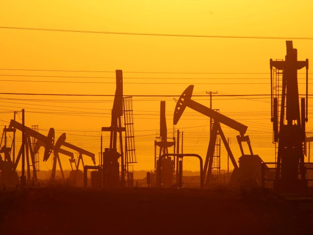 Pump jacks are seen at dawn in an oil field over the Monterey Shale formation where gas an