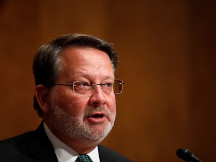 WASHINGTON, DC - JUNE 6: Sen. Gary Peters (D-MI) speaks during a Federal Spending Oversight And Emergency Management Subcommittee hearing June 6, 2018 on Capitol Hill in Washington, DC. Members of both parties raised questions about a lack of Congressional oversight of military deployments overseas. (Photo by Aaron P. Bernstein/Getty …