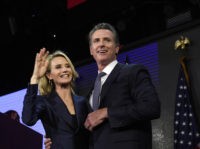 LOS ANGELES, CA - NOVEMBER 06: Democratic gubernatorial candidate Gavin Newsom and his wife Jennifer Siebel Newsom wave to supporters during election night event on November 6, 2018 in Los Angeles, California. (Photo by Kevork Djansezian/Getty Images)