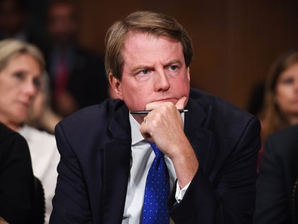 WASHINGTON, DC - SEPTEMBER 27: White House Counsel and Assistant to the President for U.S. President Donald Trump, Donald McGahn, listens as Supreme Court nominee Brett Kavanaugh testifies before the Senate Judiciary Committee on Capitol Hill on September 27, 2018 in Washington, DC. Kavanaugh was called back to testify about …