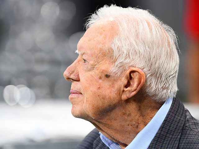 ATLANTA, GA - SEPTEMBER 30: Former president Jimmy Carter prior to the game between the At