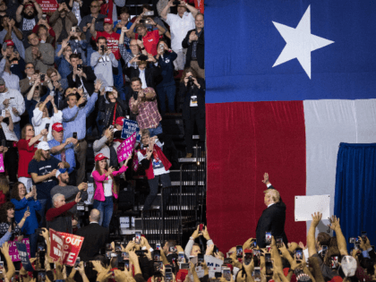 U.S. President Donald Trump takes the stage for a rally in support of Sen. Ted Cruz (R-TX)