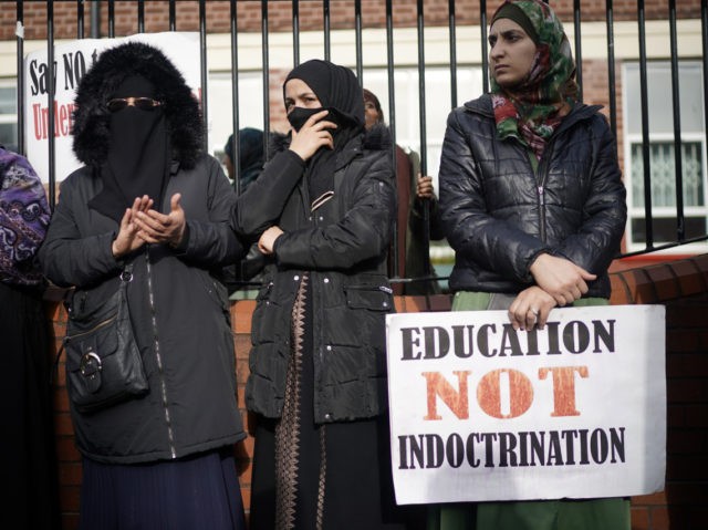 BIRMINGHAM, ENGLAND - MARCH 21: Parents, children and protestors demonstrate against the