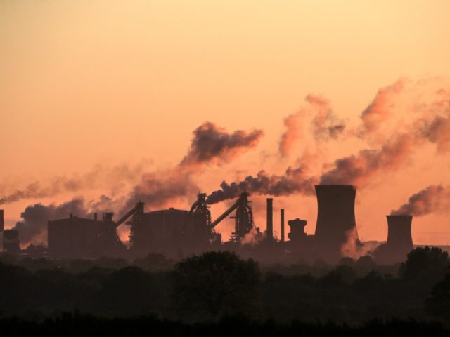British Steel's Scunthorpe plant is pictured at dawn in north Lincolnshire, north east England on May 22, 2019. - A collapse of British Steel, Britain's second biggest steelmaker, would spark the loss of up to 5,000 jobs at the group's sprawling steelworks in Scunthorpe, northern England. (Photo by Lindsey Parnaby …