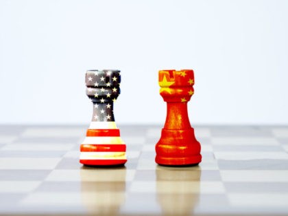 USA flag and China flag print screen on chess with white background.It is symbol of tariff trade war tax barrier between United States of America and China.-Image.