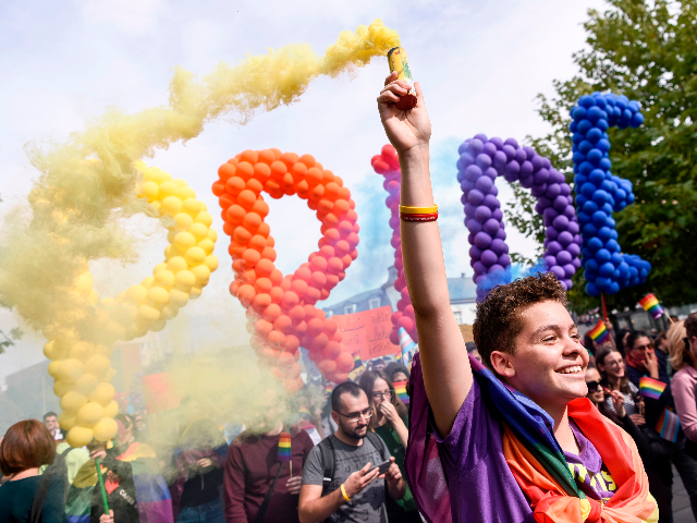 People take part at the lesbian, gay, bisexual and transgender (LGBT) Pride Parade in Pris