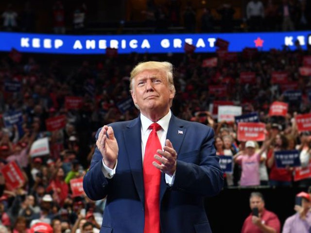 US President Donald Trump arrives for a "Keep America Great" rally at the American Airline