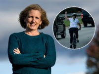 Juli Briskman, who was fired after giving US President Donald Trump's motorcade the middle finger while cycling and is running for a seat on the Loudoun County Board of Supervisors, poses October 17, 2019, in Sterling, Virginia. - Two years later, Briskman has jumped headfirst into politics and is running …