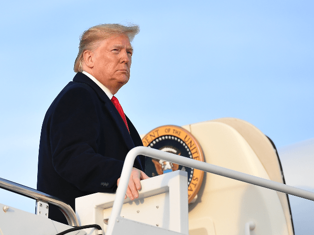 US President Donald Trump makes his way to board Air Force One before departing from Andrews Air Force Base in Maryland on November 4, 2019. - Trump is heading to Lexington, Kentucky for a rally. (Photo by MANDEL NGAN / AFP) (Photo by MANDEL NGAN/AFP via Getty Images)