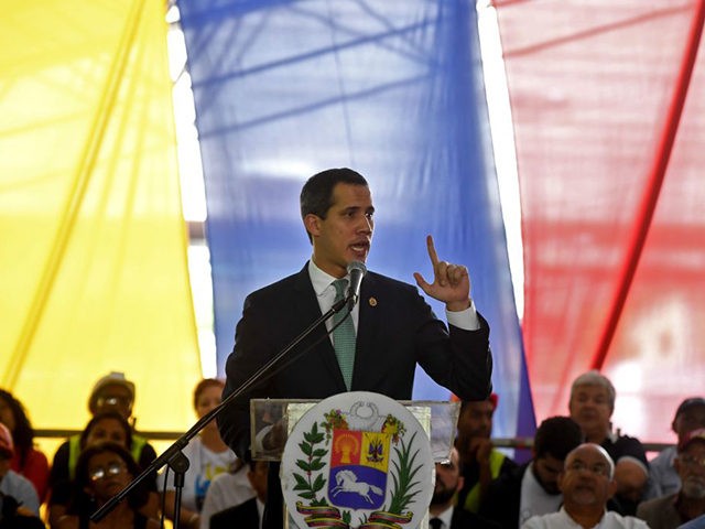Venezuelan opposition leader and self-proclaimed acting president Juan Guaido speaks durin