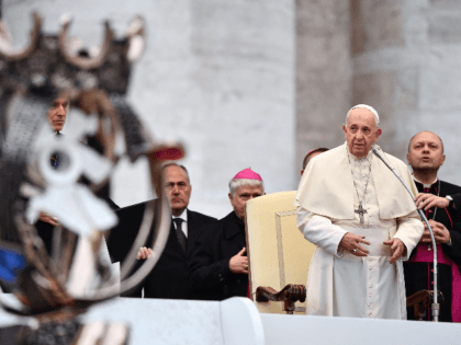 Pope Francis prepares to address worshipers during the weekly general audience on November