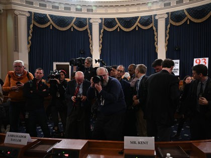 US-POLITICS-CONGRESS-TRUMP-IMPEACHMENT Media wait for Ambassador William Taylor and Deputy Assistant Secretary George Kent to arrive during the first open hearings in the impeachment inquiry into US President Donald Trump in Washington, DC on November 13, 2019. - Donald Trump faces the most perilous challenge of his three-year presidency as public hearings …