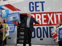 MANCHESTER, ENGLAND - NOVEMBER 15: Prime Minister Boris Johnson addresses his supporters prior to boarding his General Election campaign trail bus on November 15, 2019 in Manchester, England. (Photo by Frank Augstein-WPA Pool/Getty Images)