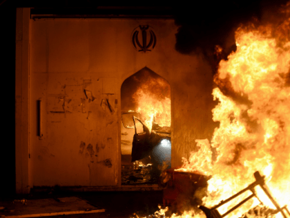 Flames consume Iran's consulate in the southern Iraqi Shiite holy city of Najaf on November 27, 2019, two months into the country's most serious social crisis in decades. - Iraqi protesters torched the Iranian consulate in the holy city of Najaf in a dramatic escalation of anti-government demonstrations that have …