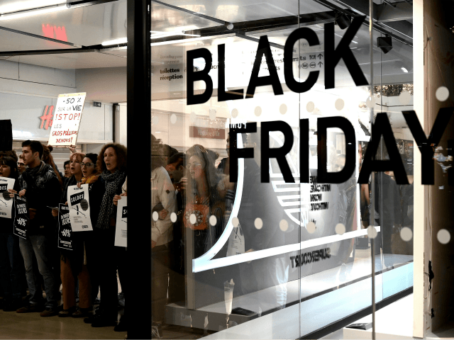 "Youth for climate" activists demonstrate against the Black Friday in the Quatre Temps mall at La Defense business district, West of Paris, on November 29, 2019. (Photo by Philippe LOPEZ / AFP) (Photo by PHILIPPE LOPEZ/AFP via Getty Images)