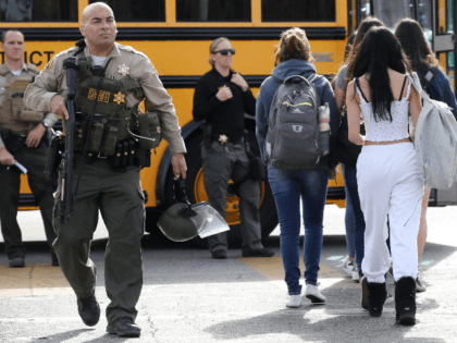 Students are evacuated from Saugus High School onto a school bus after a shooting at the school left two students dead and three wounded on November 14, 2019 in Santa Clarita, California. A suspect in the shooting is being treated at a local hospital for a gunshot wound to the …