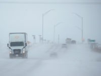 RUDD, IOWA - NOVEMBER 27: Snow blows across a road on November 27, 2019 near Rudd, Iowa. A winter storm, which dumped rain, ice, snow and brought high winds into much of the upper Midwest, has been hampering holiday travel by road and by air on one of the busiest …