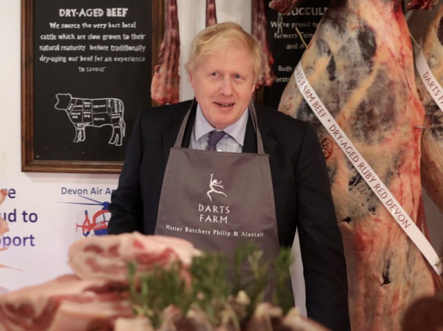 TOPSHAM, UNITED KINGDOM - NOVEMBER 28: British Prime Minister and Conservative Party leader, Boris Johnson visits Darts Farm Shopping Village as he campaigns in Devon ahead of the upcoming general election on November 28, 2019 in Topsham, England. UK voters are set to go to the polls on December 12 …