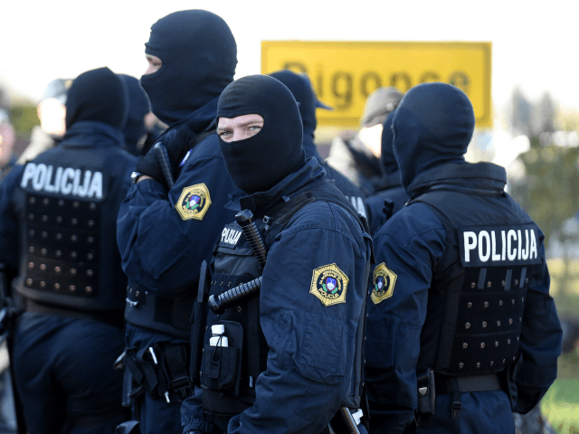 Slovenian special police forces stand after been deployed in the disputed area near the Ha