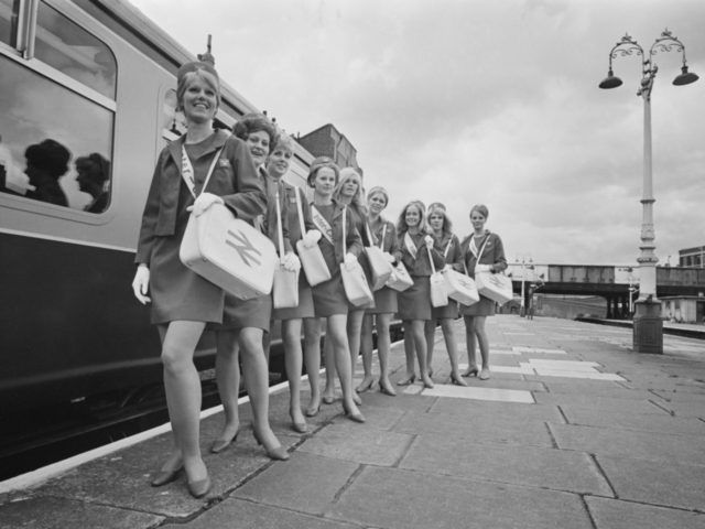 A group of 'Inter-City Girls' employed by British Rail to deal with passenger inquiries, as part of the company's latest marketing campaign for Inter-City train services, 6th May 1968. Not in order: Annette Middleton, Penny Gray, Angela Young, Kay Gill, Annabel Cholmeley, Sue Cameron, Sue Ann White, Veronica Cross, Gillian …