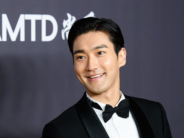 South Korean singer, songwriter, model, and actor Choi Si-won attends the red carpet for the 2018 American Foundation for AIDS Research (amFAR) Hong Kong gala at Shaw Studios in Hong Kong on March 26, 2018. / AFP PHOTO / ANTHONY WALLACE (Photo credit should read ANTHONY WALLACE/AFP via Getty Images)