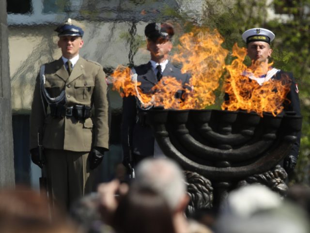 WARSAW, POLAND - APRIL 19: Polish soldiers attend the main commemoration ceremony of the 75th anniversary of the Warsaw Ghetto Uprising on April 19, 2018 in Warsaw, Poland. The Warsaw Ghetto was a prison created by the German military during its occupation of Warsaw during World War II. Starting in …