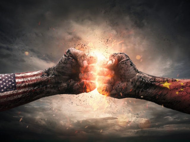 Conflict, close up of two fists hitting each other over dramatic background with copy spac