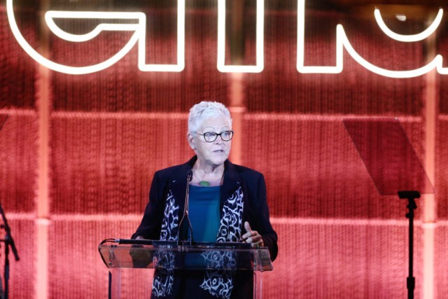 PACIFIC PALISADES, CALIFORNIA - SEPTEMBER 28: Gina McCarthy speaks onstage during the Envi