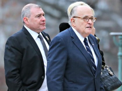 Lawyer for US President Donald Trump, Rudy Giuliani and Soviet-born businessman who served as Giuliani's fixer in Ukraine, Lev Parnas arrive for the funeral of late President George H.W. Bush at the National Cathedral in Washington, DC on December 5, 2018. (Photo by ALEX EDELMAN/AFP via Getty Images)