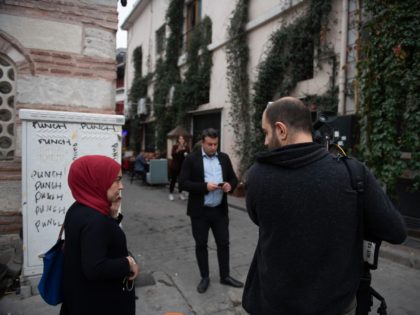 ISTANBUL, TURKEY - NOVEMBER 11: A TV journalist reports from the crime scene in front of the a home and office reportedly belonging to James Le Mesurier, where his body was found dead in the early hours of this morning on November 11, 2019 in the Karakoy district of Istanbul, …