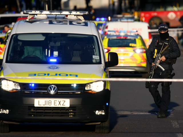 LONDON, ENGLAND - NOVEMBER 29: A Metropolitan Police Armed Response officer stands guard n