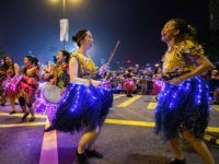Performers take part in the annual Lunar New Year parade in the Kowloon district of Hong Kong on February 5, 2019 to mark the Year of the Pig. (Photo by Anthony WALLACE / AFP) (Photo credit should read ANTHONY WALLACE/AFP via Getty Images)