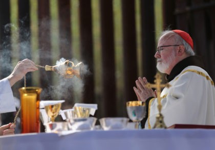 NOGALES, AZ - APRIL 01: Archbishop of Boston Cardinal Sean O'Malley celebrates Mass next to the U.S.-Mexico border fence during a special 'Mass on the Border' on April 1, 2014 in Nogales, Arizona. Catholic bishops led by Cardinal O'Malley held the mass to pray for comprehensive immigration reform and for …