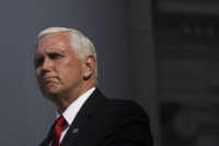 ARLINGTON, VA - NOVEMBER 11: U.S. Vice President Mike Pence delivers remarks at a Veterans Day event at Arlington National Cemetery on November 11, 2019 in Arlington, Virginia. On Monday, the United States is observing Veterans Day, a federal holiday that honors Americans who served in the U.S. military. (Photo …