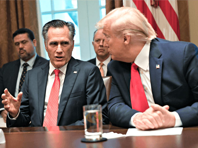 President Donald Trump, right, listens as Sen. Mitt Romney, R-Utah, third from left, speaks as they participate in a meeting in the Cabinet Room of the White House in Washington, Friday, Nov. 22, 2019, on youth vaping and the electronic cigarette epidemic. (AP Photo/Susan Walsh)